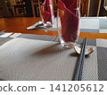 Chinese restaurant empty dinner placement with napkins and chopsticks 141205612