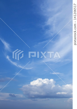 Blue sky with dramatic clouds. Cloudy daytime sky with soft clouds. Blue sky with dramatic clouds. Cloudy daytime sky with soft clouds. 141206517