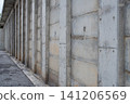 Concrete wall beneath the road 141206569
