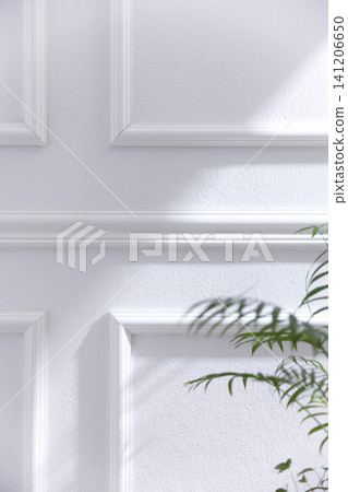 Elegant White Wainscoting Wall Background with Natural Sunlight and Green Plant 141206650