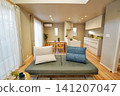 Living room with an open ceiling and stylish sofa 141207047