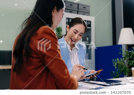Businessman collaborate on project analysis with financial graphs. Strategic teamwork and insights drive company growth and success. Businessman collaborate on project analysis with financial graphs. Strategic teamwork and insights drive company growth and success. 141207070