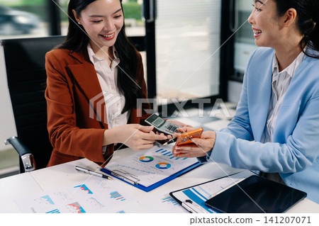 Business meeting account managers crew working search page on computer with new startup project. Idea presentation, analyze plans. Business meeting account managers crew working search page on computer with new startup project. Idea presentation, analyze plans. 141207071
