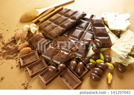 White chocolate. Various chocolates with milk and hazelnuts White chocolate. Various chocolates with milk and hazelnuts 141207081
