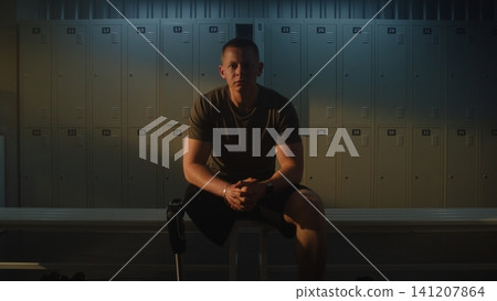 Amputee Athlete Reflecting and Stretching Neck After Intense Gym Session Amputee Athlete Reflecting and Stretching Neck After Intense Gym Session 141207864