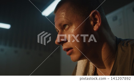 Sweaty Athlete Catching Breath After Intense Workout Sweaty Athlete Catching Breath After Intense Workout 141207892