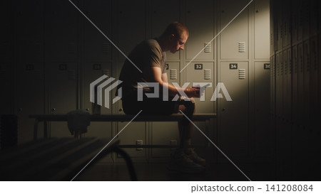 Adaptive Athlete Filling Out Rehabilitation Progress Diary on Smartphone 141208084
