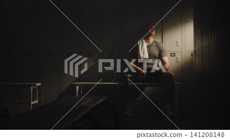 Recovery of Young Man with Bionic Leg in Locker Room Recovery of Young Man with Bionic Leg in Locker Room 141208148