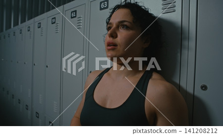Exhausted Woman Athlete Suffering from Emotional Burnout Exhausted Woman Athlete Suffering from Emotional Burnout 141208212