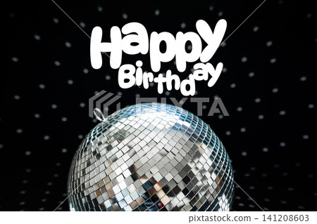 Happy birthday celebration with a disco ball and festive decorations in a dark setting 141208603