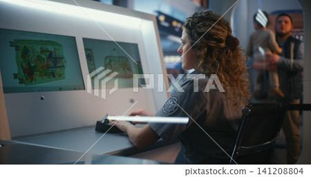 Aviation Safety Specialist Overseeing Baggage Conveyor and Scanning Equipment Aviation Safety Specialist Overseeing Baggage Conveyor and Scanning Equipment 141208804