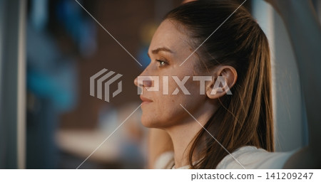 Woman Standing with Raised Arms for Body Scan at International Terminal 141209247