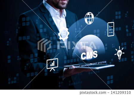 Man using laptop to display content management system with various icons in background Man using laptop to display content management system with various icons in background 141209310
