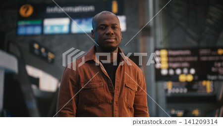 Confident Male Passenger Ready for Boarding in Terminal Confident Male Passenger Ready for Boarding in Terminal 141209314
