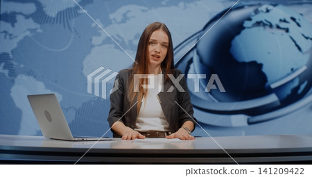 Energetic Woman Journalist Looking at Camera and Presents News Stories Clearly and Emotionally Energetic Woman Journalist Looking at Camera and Presents News Stories Clearly and Emotionally 141209422