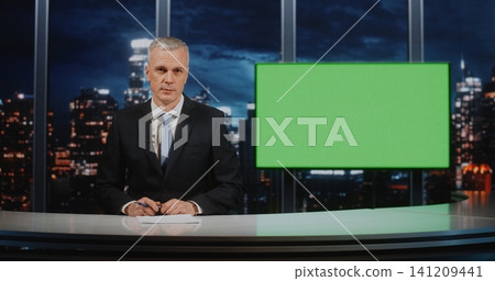Senior News Presenter Reporting Live from Studio with Green Screen for Dynamic Background Keying Senior News Presenter Reporting Live from Studio with Green Screen for Dynamic Background Keying 141209441