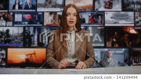 News Presenter Delivers Analytical Report From Modern Newsroom Desk News Presenter Delivers Analytical Report From Modern Newsroom Desk 141209494