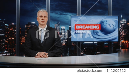Mature Professional News Correspondent Presenting Information at Desk in Modern Newsroom Studio Mature Professional News Correspondent Presenting Information at Desk in Modern Newsroom Studio 141209512