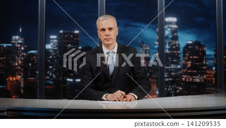 Confident Mature Male Host Engaging in Resonant Topic Debate in Professional Television Studio Confident Mature Male Host Engaging in Resonant Topic Debate in Professional Television Studio 141209535