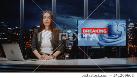 Professional Female News Anchor Presenting Breaking News in Modern Digital Television Studio Professional Female News Anchor Presenting Breaking News in Modern Digital Television Studio 141209668