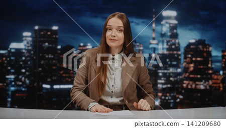 News Host Presents Daily Headlines From modern Television Set 141209680
