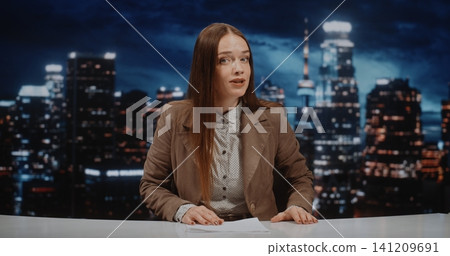 News Host Presents Daily Headlines From modern Television Set 141209691