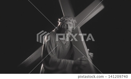 Dramatic Statue of Jesus Christ Carrying Cross with Cinematic Lighting on Black Background Dramatic Statue of Jesus Christ Carrying Cross with Cinematic Lighting on Black Background 141209740