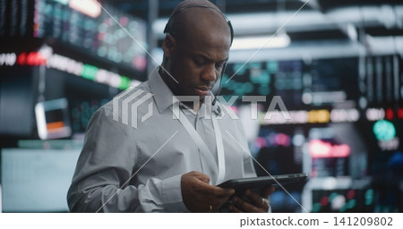 Senior Broker Analyzing Market Trends With Calm Confidence Senior Broker Analyzing Market Trends With Calm Confidence 141209802