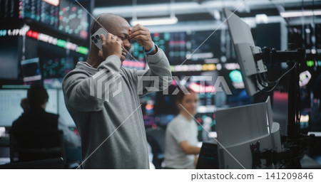 Joyful Broker Pleased Massive Profit Surge, Calls on Smartphone Joyful Broker Pleased Massive Profit Surge, Calls on Smartphone 141209846