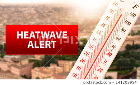 Heatwave alert shows high temperature on thermometer over city background during summer season Heatwave alert shows high temperature on thermometer over city background during summer season 141209954