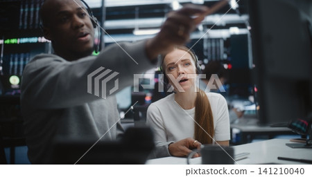 Diverse Professional Team Reviewing Investment Data in Global Brokerage Firm Diverse Professional Team Reviewing Investment Data in Global Brokerage Firm 141210040