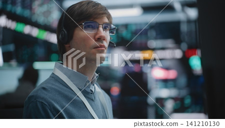 Determined Young Specialist Deeply Engaged in Technical Analysis Determined Young Specialist Deeply Engaged in Technical Analysis 141210130