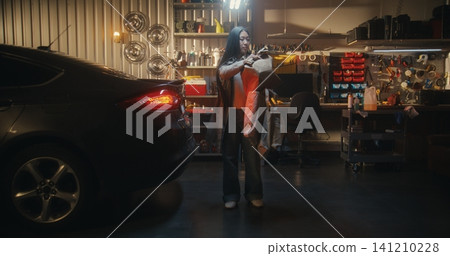After Successful Shopping Trip, Young Woman Balances Tote Bags 141210228