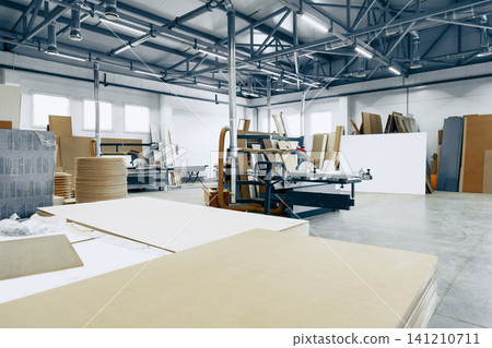 Furniture workshop space with tools and materials at work Furniture workshop space with tools and materials at work 141210711