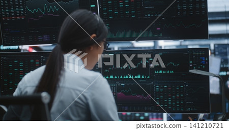 Female Executive Manages Global Portfolios in Huge Digital Stock Exchange Female Executive Manages Global Portfolios in Huge Digital Stock Exchange 141210721