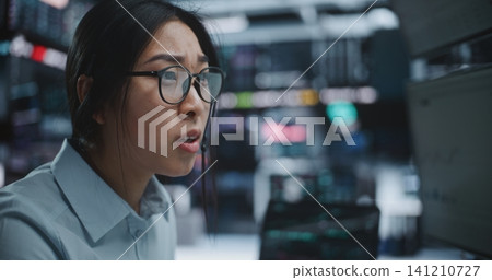 Trader Calls Urgently on Mobile Phone, Distressed Crashing Market Indices on Screens Trader Calls Urgently on Mobile Phone, Distressed Crashing Market Indices on Screens 141210727