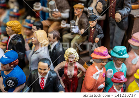 Naples, italy. December 28, 2024. Handcrafted terracotta figurines depicting popular celebrities and political figures displayed in a shop in san gregorio armeno, naples, italy 141210737