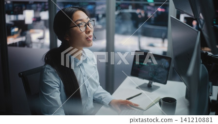Lady Broker Momentarily Steps Away From Analyzing Complex Charts Chat With Loved One on Smartphone Lady Broker Momentarily Steps Away From Analyzing Complex Charts Chat With Loved One on Smartphone 141210881
