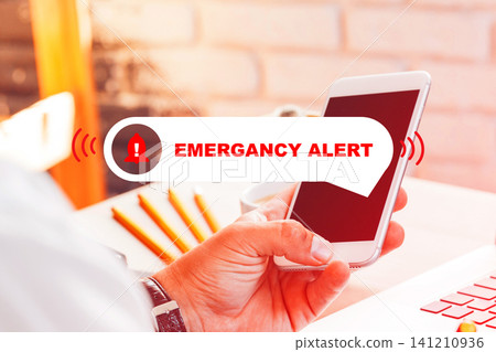 Emergency service call being made using mobile phone during daytime in an indoor setting Emergency service call being made using mobile phone during daytime in an indoor setting 141210936
