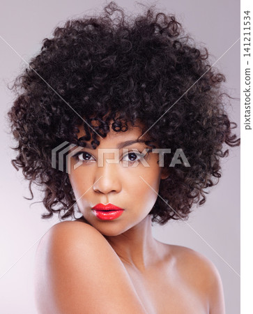Skincare, beauty and serious portrait of black woman with makeup, afro and confidence in studio. Dermatology, facial cosmetics and African model girl with red lipstick isolated on white background 141211534
