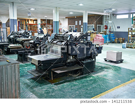 Industrial, printer and machinery in printing, factory and industry for newspaper, magazine and books. Inside, room and printing with paper, ink and equipment for distribution, media and publication Industrial, printer and machinery in printing, factory and industry for newspaper, magazine and books. Inside, room and printing with paper, ink and equipment for distribution, media and publication 141211538