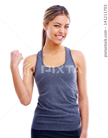 Studio, athlete and portrait of woman, fist and celebrate to workout for fitness, health and wellness. White background, adult and female person with care for sports, exercise and muscle for girl Studio, athlete and portrait of woman, fist and celebrate to workout for fitness, health and wellness. White background, adult and female person with care for sports, exercise and muscle for girl 141211703