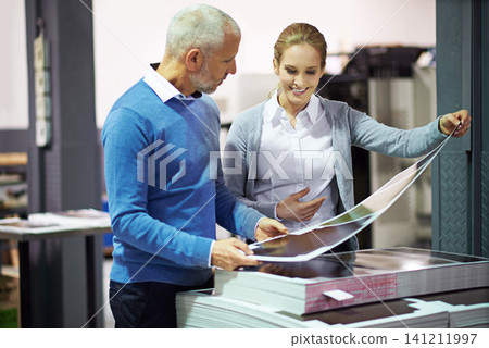 Factory, business people and check paper in printing industry, warehouse and creative sector for design project. Teamwork, man and woman communication, discussion and work quality in collaboration Factory, business people and check paper in printing industry, warehouse and creative sector for design project. Teamwork, man and woman communication, discussion and work quality in collaboration 141211997
