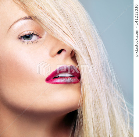 Woman, lipstick and skincare in studio with portrait for glamour shine on grey background with confidence. Girl, cosmetics and beauty for dermatology for wellness, facial and treatment for vanity Woman, lipstick and skincare in studio with portrait for glamour shine on grey background with confidence. Girl, cosmetics and beauty for dermatology for wellness, facial and treatment for vanity 141212030