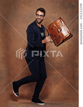 Man, bag and smile for fashion, style and trendy for aesthetic, clothes and comfort in studio. Model or young male and happy with briefcase for walk, retro and cool for vibrant and joy indoor Man, bag and smile for fashion, style and trendy for aesthetic, clothes and comfort in studio. Model or young male and happy with briefcase for walk, retro and cool for vibrant and joy indoor 141212249