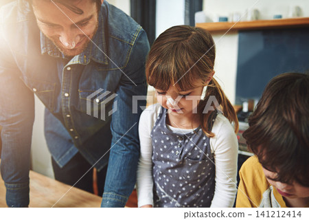 Family, father and kids baking in kitchen, bonding and preparation for lunch in home. Dad, children and cooking together, teaching or learn to help with flour dough on nose of girl with happy parent Family, father and kids baking in kitchen, bonding and preparation for lunch in home. Dad, children and cooking together, teaching or learn to help with flour dough on nose of girl with happy parent 141212414