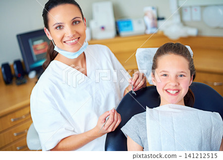 Dentist, chair and portrait of child for consulting, teeth whitening and wellness in clinic. Healthcare, dentistry and woman and girl with tools for dental hygiene, oral care and medical services Dentist, chair and portrait of child for consulting, teeth whitening and wellness in clinic. Healthcare, dentistry and woman and girl with tools for dental hygiene, oral care and medical services 141212515