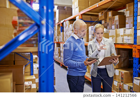 Tablet, clipboard and business people in storage warehouse for logistics, supply chain and cardboard box. Package, ecommerce and employees with technology for shipping, cargo and stock taking Tablet, clipboard and business people in storage warehouse for logistics, supply chain and cardboard box. Package, ecommerce and employees with technology for shipping, cargo and stock taking 141212566