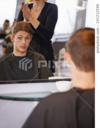 Confident, man and female hairdresser in salon for grooming, styling and haircut. Woman, beauty shop and male customer in chair for treatment, blow out or conditioning looking at reflection in mirror Confident, man and female hairdresser in salon for grooming, styling and haircut. Woman, beauty shop and male customer in chair for treatment, blow out or conditioning looking at reflection in mirror 141212598