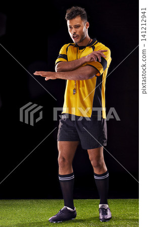 Man, referee and sport for soccer, rules and game for active and sportswear on grass or field. Arab person, sportsman or athlete with kit and practice for strong and competitive on dark background 141212941